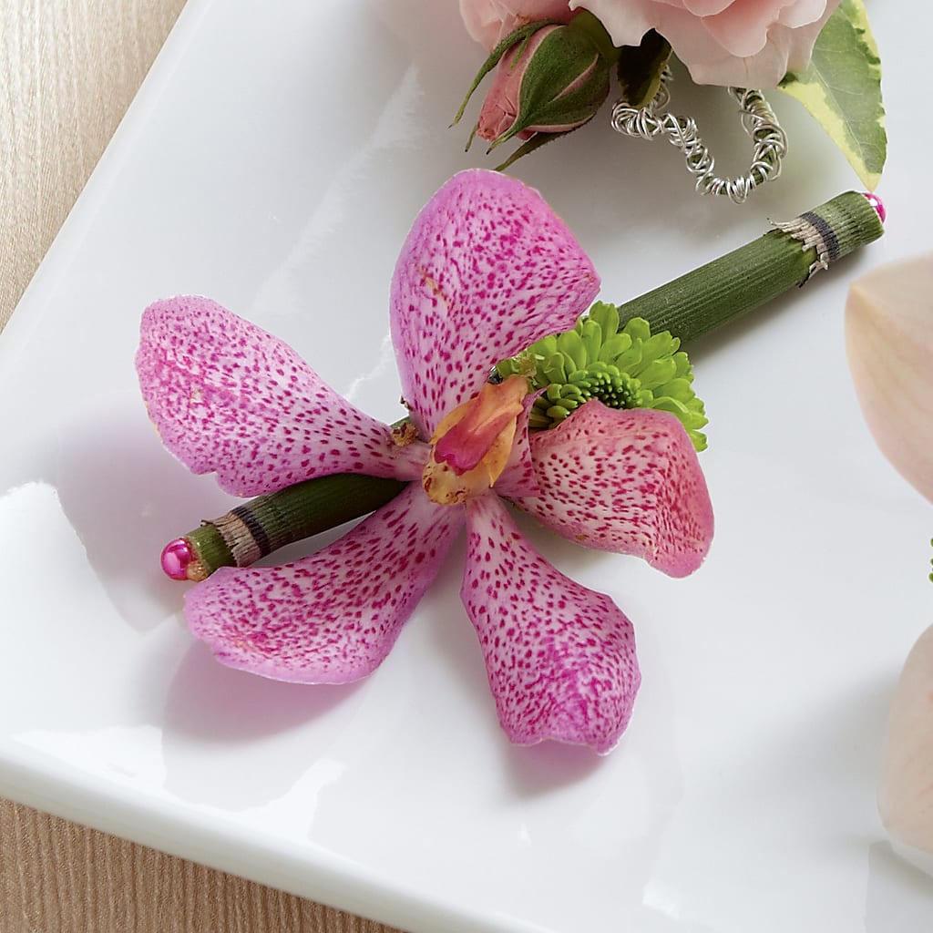 Pink Mokara Boutonniere – HIRT'S FLOWERS INC, Strongsville OH