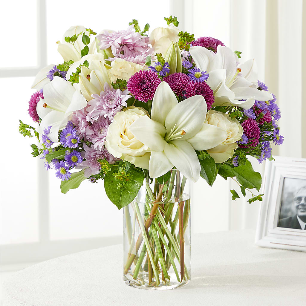 white lilies and purple roses Wishing Peace Bouquet – ivory, lavender, purple, white flower arrangement | Strongsville, OH