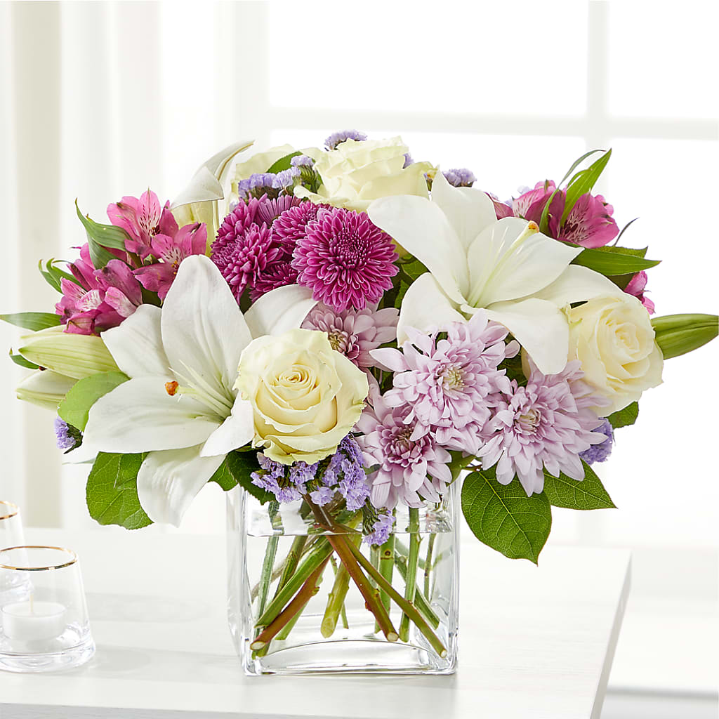 lavender and white flower bouquet Cared For Bouquet – ivory, lavender, purple, white flower arrangement | Strongsville, OH